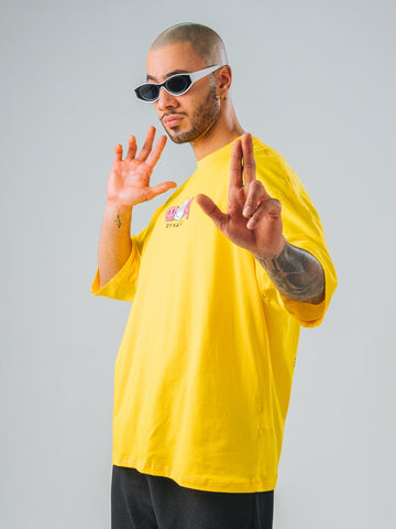 Camiseta Oversize Amarillo Caritas